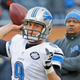 Lions QB Matthew Stafford warms up as coach Jim Caldwell watches in Chicago in 2014.